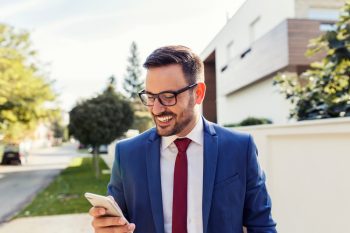 Smiling,Modern,Young,Businessman,Typing,Text,Message